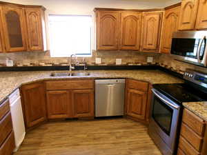 Kitchen with stainless steel appliances and Granite countertops
