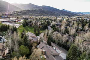 Aerial perspective of suburban area with mountains