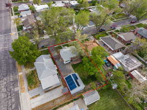Aerial view of residential area with property boundaries highlighted