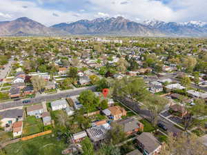 Aerial view of residential area featuring a mountain backdrop