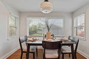 Dining room featuring wood finished floors