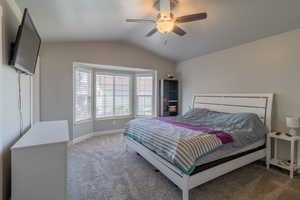 Bedroom with carpet and a ceiling fan