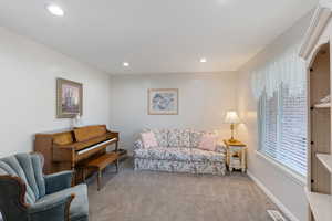 Carpeted Formal Living Room featuring baseboards and recessed lighting