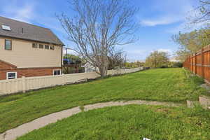 View of fenced backyard