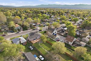 Aerial view of residential area with a mountain backdrop
