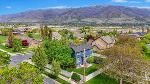 Aerial view of residential area with a mountainous background