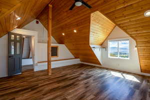 Additional living space featuring wood ceiling, a ceiling fan, dark wood-style flooring, and recessed lighting