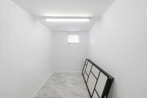Empty room with light marble finish floors and baseboards