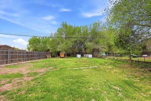 View of fenced backyard
