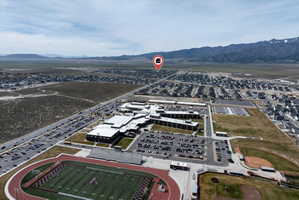 View of property location featuring mountains. Cedar Valley High School