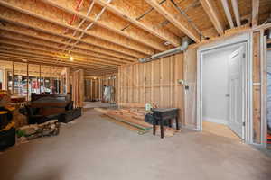 View of unfinished below grade area. Newly framed basement