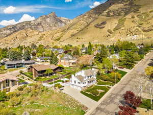 Aerial view of residential area featuring a mountain backdrop