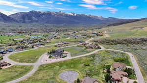 Aerial perspective of suburban area featuring mountains
