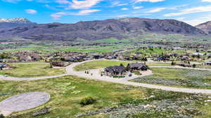 Mountain view featuring nearby suburban area