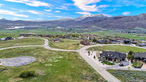 Aerial view of residential area with a mountain backdrop