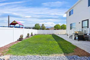 View of fenced backyard