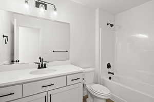 Full bathroom with vanity and tub / shower combination