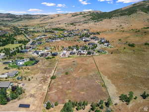 Bottom left corner white car is property location and Coldwell Banker Sign