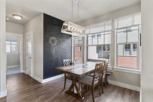Dining room featuring wood finished floors