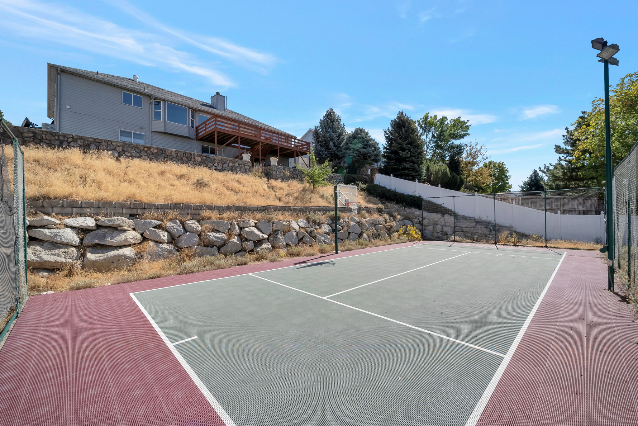View of sport court featuring community basketball court