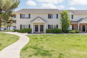 Colonial house with a front yard