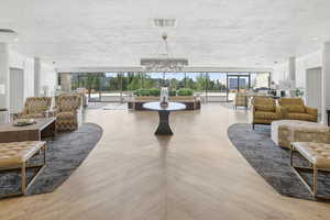 Building lobby featuring a textured ceiling