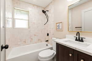 All new bathroom with beautiful tile surround, new tub, tile, plumbing fixtures, vanity, marble tops, mirrors etc