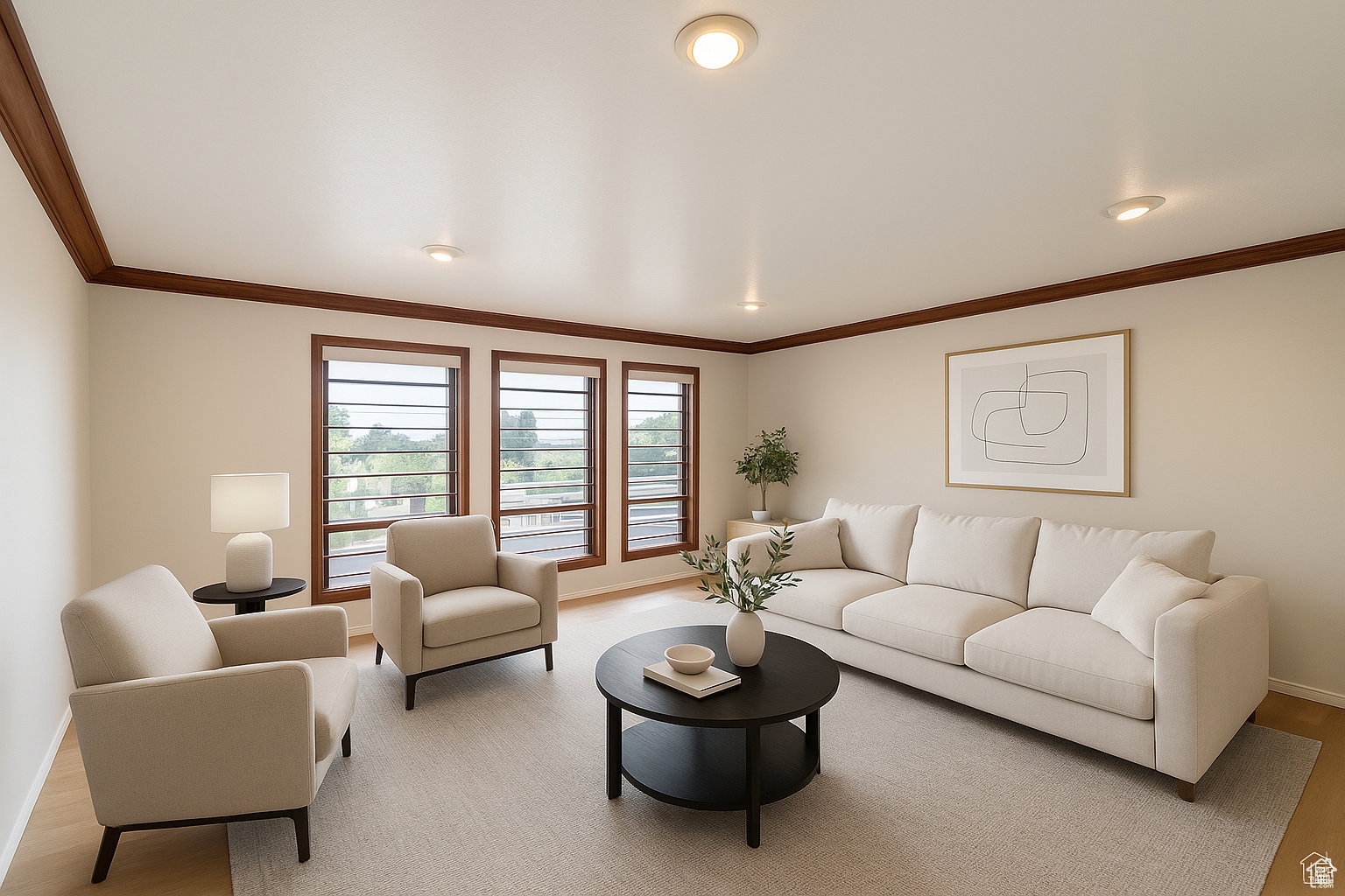 Living room with light wood-style floors and crown molding