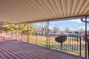 Wooden deck featuring a residential view