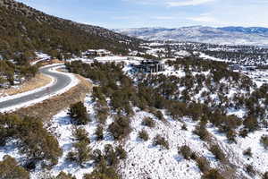 Snowy aerial view with a mountain view