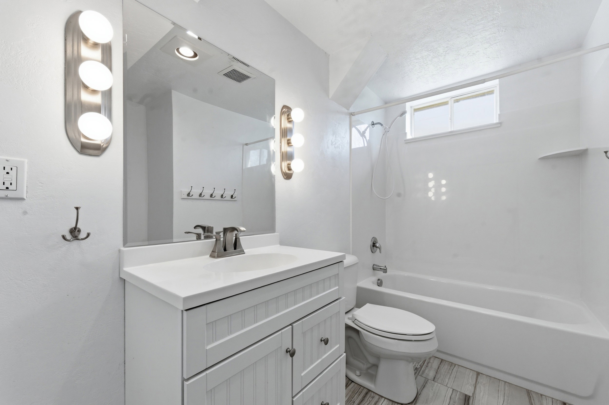 Full bathroom with vanity and shower / bath combination