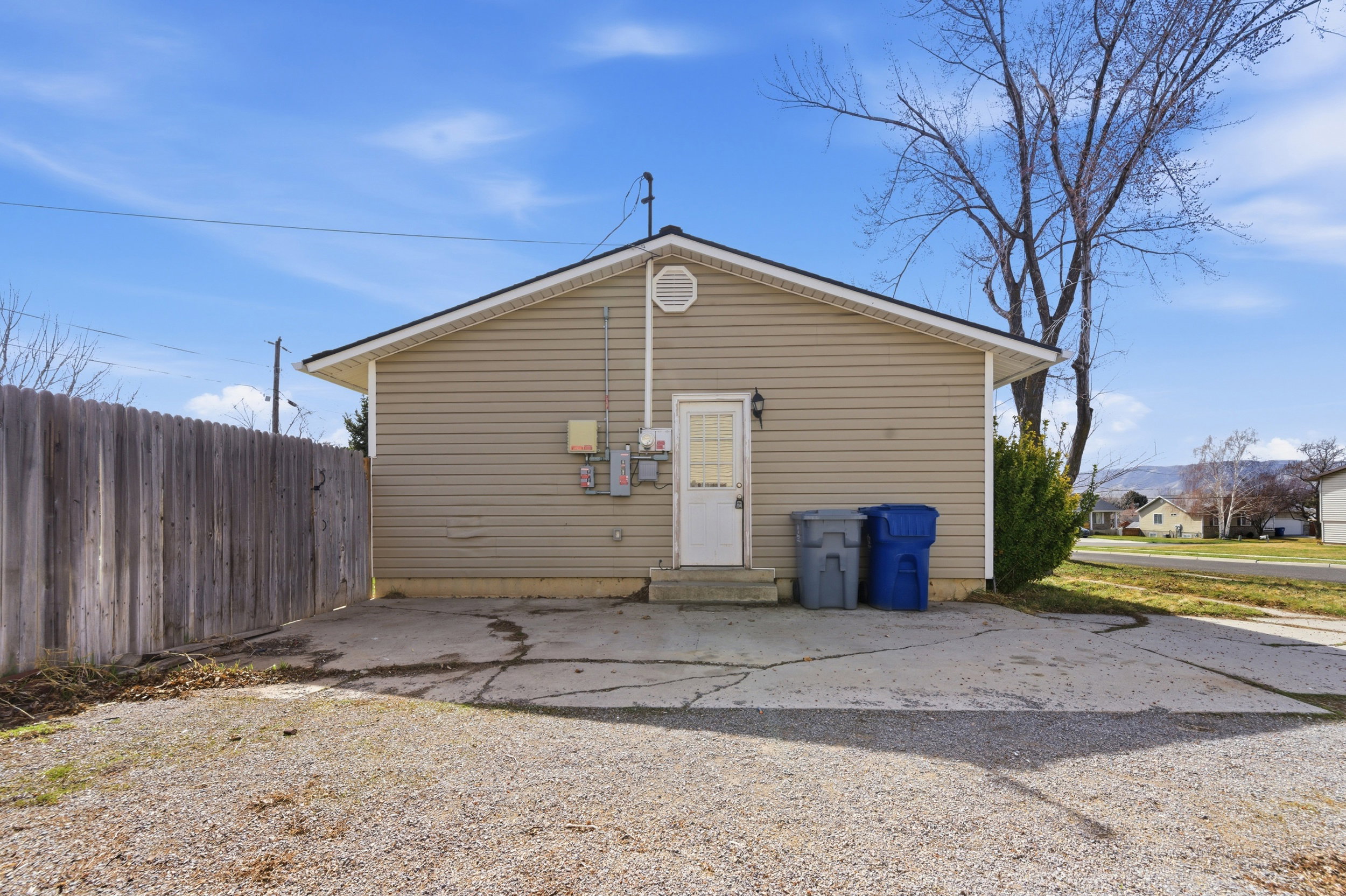 Back of property with a patio