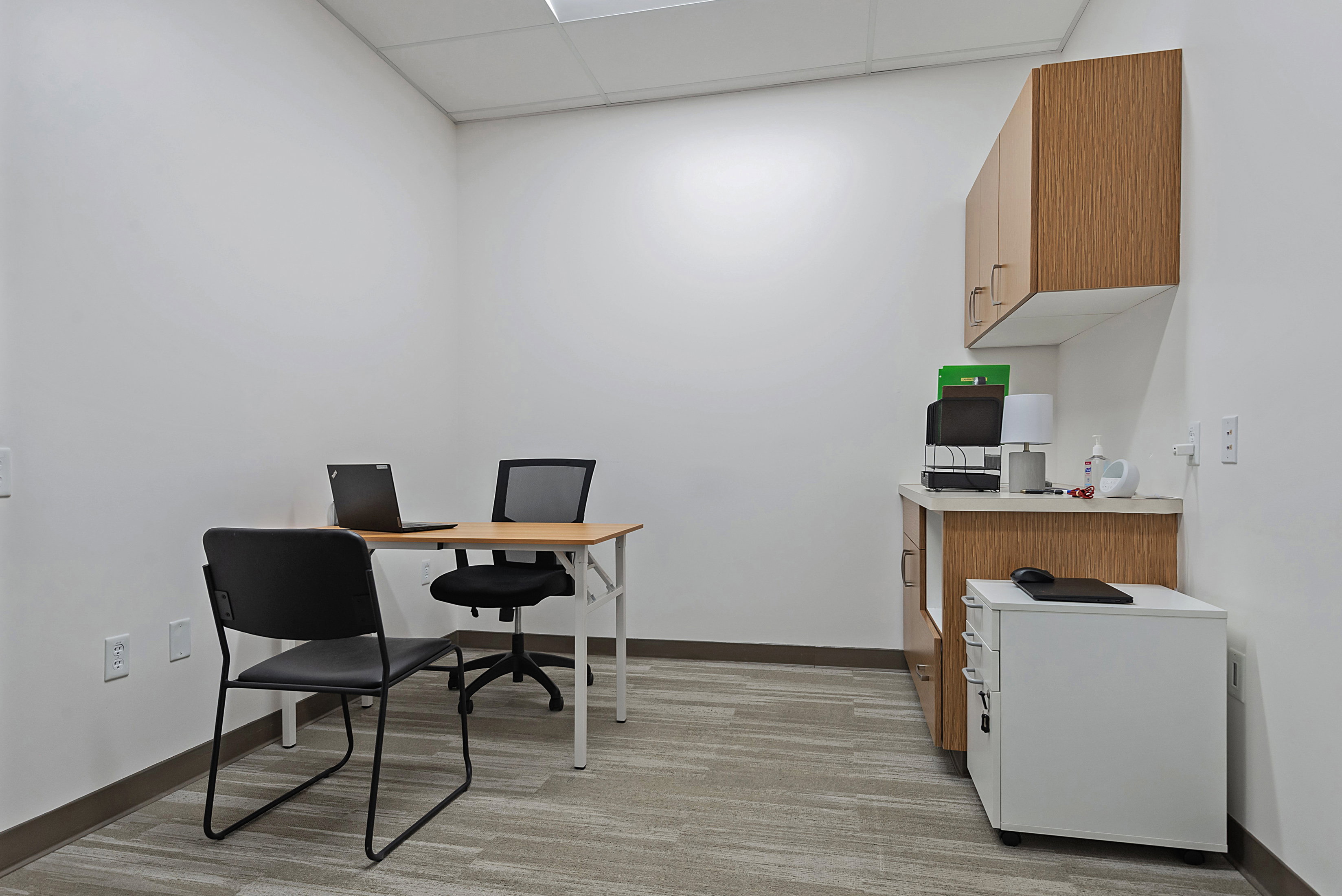 Home office featuring a paneled ceiling