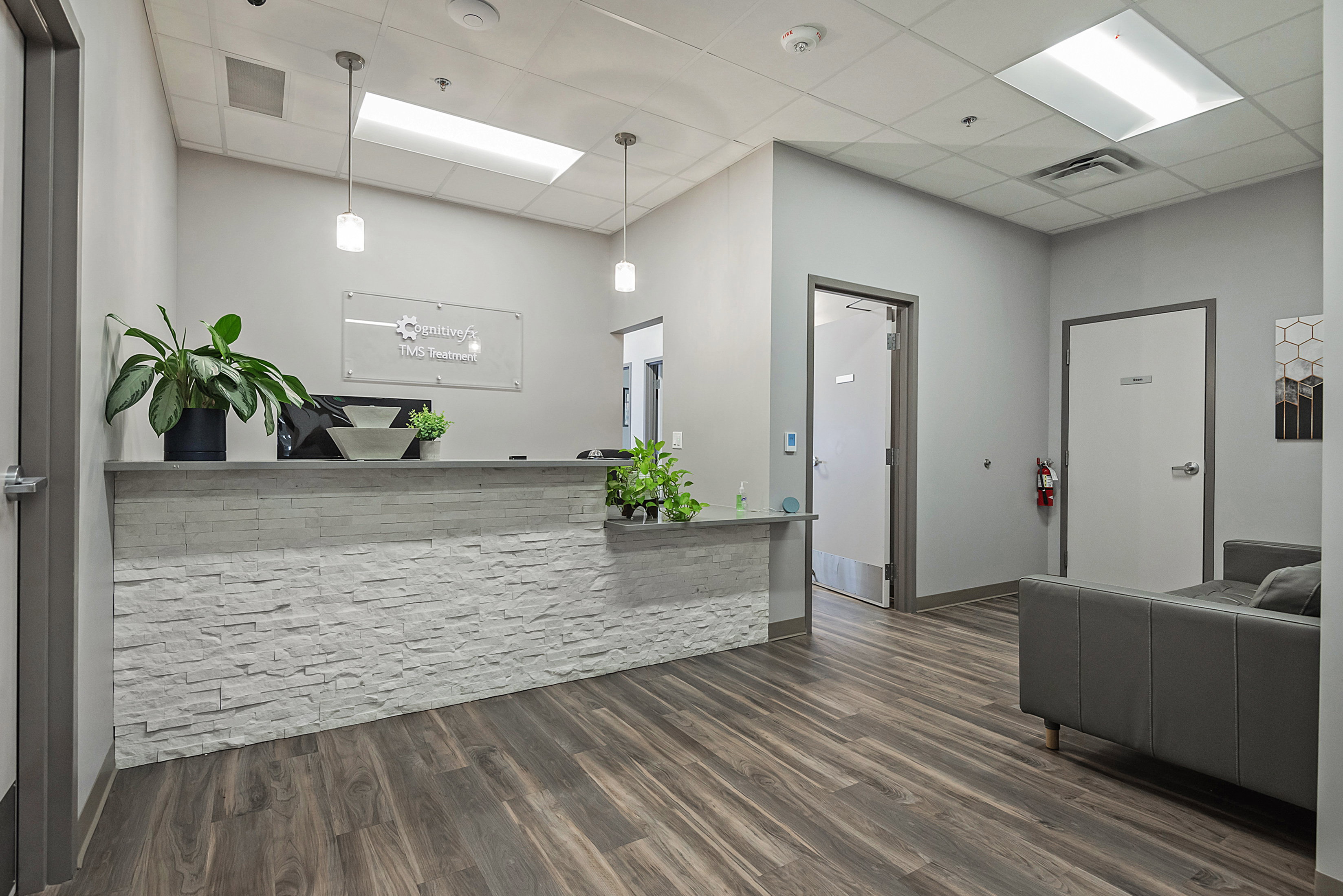 Welcome area featuring a drop ceiling