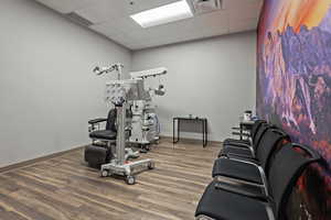 Workout room with a paneled ceiling
