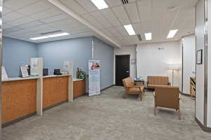 Welcome area with a paneled ceiling