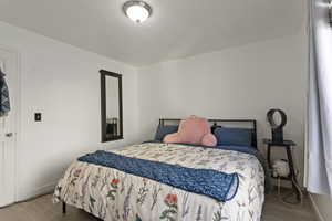 Bedroom featuring light wood-type flooring