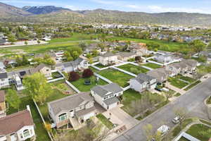 Aerial view of residential area with a mountain backdrop