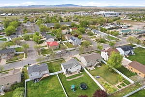 Aerial perspective of suburban area with a mountainous background