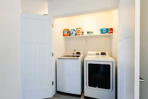 Laundry area featuring washing machine and dryer