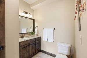 Bathroom featuring vanity and light tile patterned floors