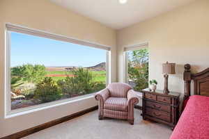 Bedroom featuring a mountain view, light colored carpet, view of golf course, and recessed lighting