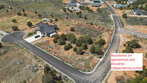 Aerial overview of property's location featuring property parcel outlined (boundaries are approximate)