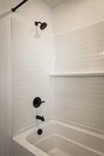 Full bathroom featuring shower / bath combination