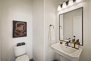 Bathroom featuring toilet and a sink