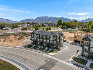 Aerial perspective of suburban area with mountains