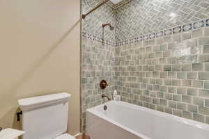 Bathroom with toilet and  shower combination