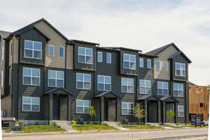 View of front of home with board and batten siding