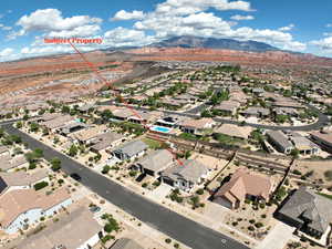 Aerial perspective of suburban area featuring mountains