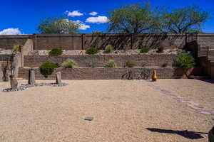 View of fenced backyard